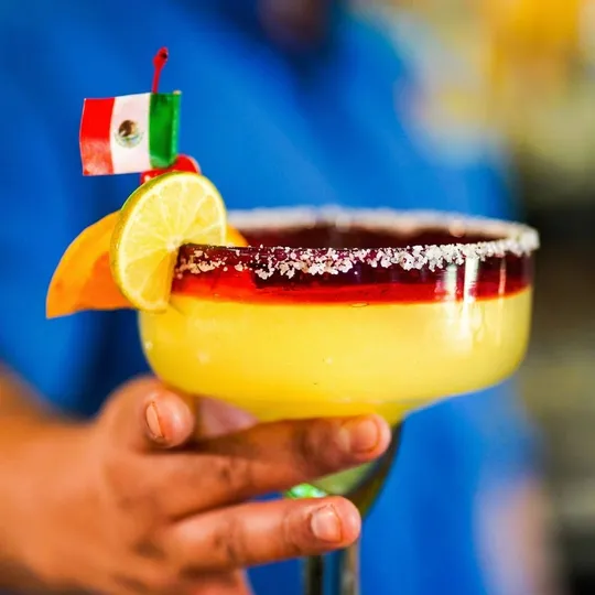 Layered sunrise margarita with salt rim at Ixtapa Cantina bar, Lunenburg MA